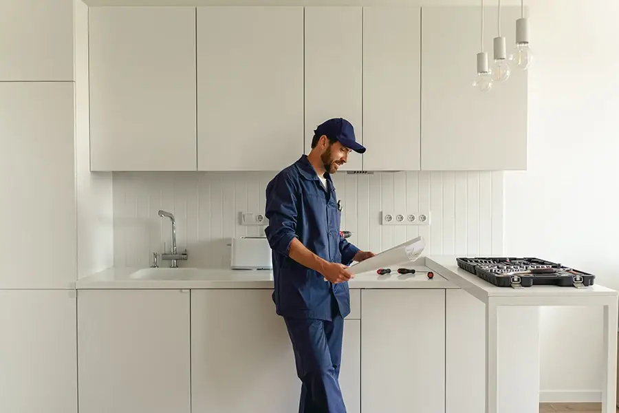 Appliance repair North York technician fixing kitchen appliance